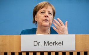 Angela Merkel sustine ca aceasta criza va mai dura